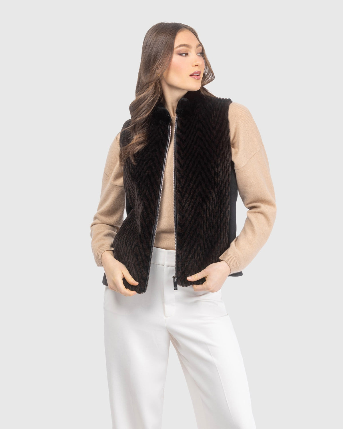 Select shearling lamb chevron grooved zip vest with wool back crafted from Loro Piana in dark brown and black, front view