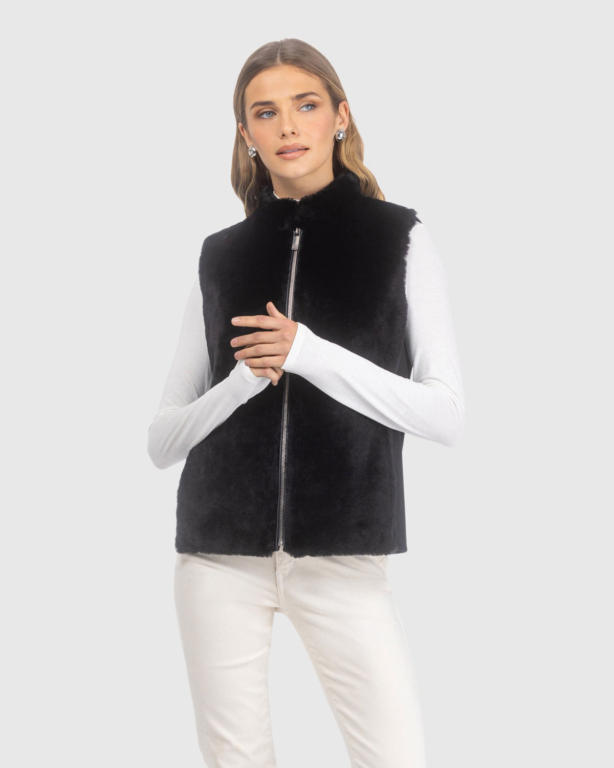 Select shearling lamb zip vest with wool back crafted from Loro Piana in black, front view