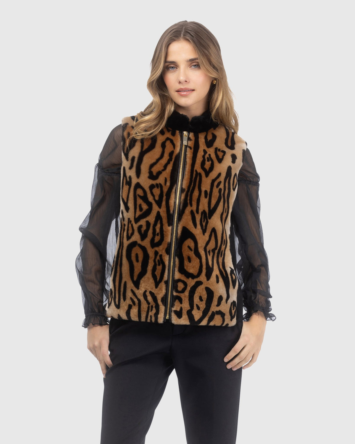 Select shearling lamb zip vest with wool back crafted from Loro Piana in ocelot print and black, front view